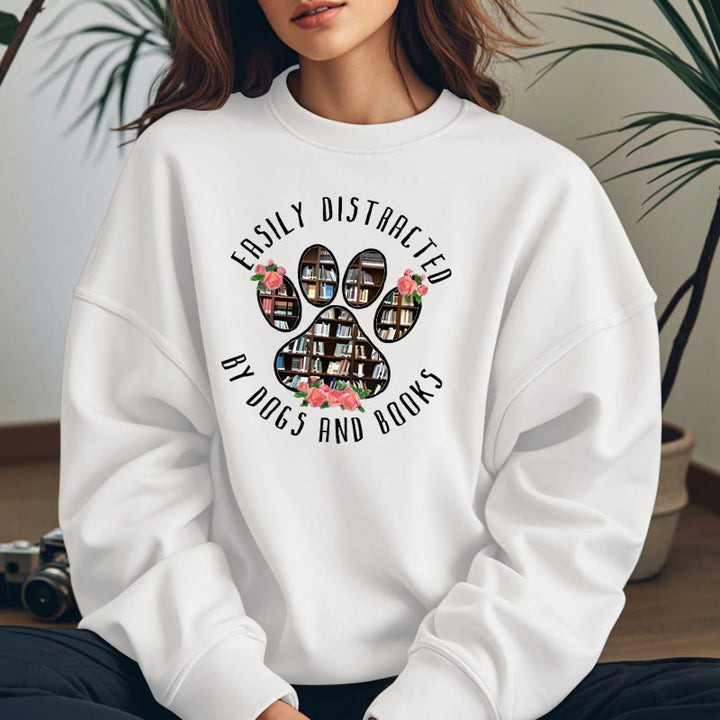 EASILY DISTRACTED BY DOGS AND BOOKS Womens Crewneck Sweatshirt Pullover