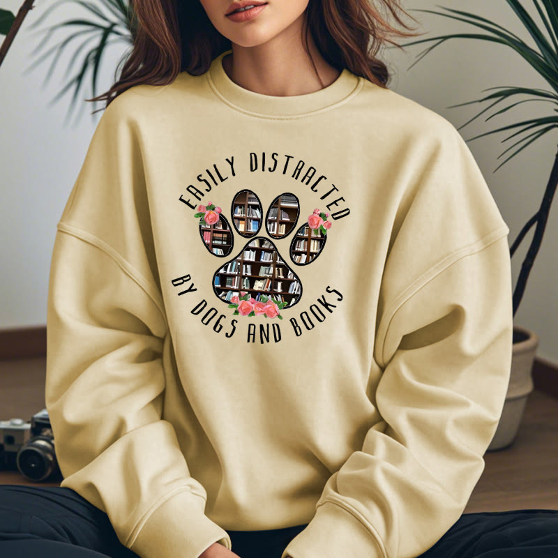 EASILY DISTRACTED BY DOGS AND BOOKS Womens Crewneck Sweatshirt Pullover