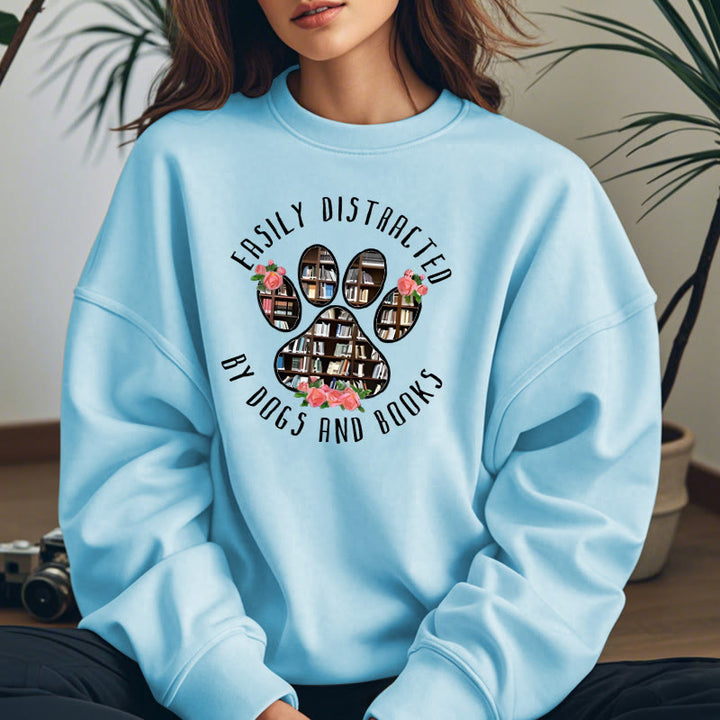 EASILY DISTRACTED BY DOGS AND BOOKS Womens Crewneck Sweatshirt Pullover